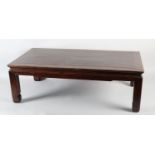 A CHINESE ROSEWOOD OPIUM TABLE, rectangular low set, moulded apron and legs, 91cm long x 48cm wide x