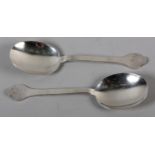 A PAIR OF GEORGE V SILVER SERVING SPOONS, Wm Hutton & Son Ltd, Sheffield 1925, with trefoil