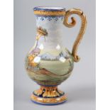 A MONTAGNON NEVERS FAIENCE EWER polychrome painted with a classical scene of infants in a rural