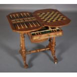 A VICTORIAN FIGURED WALNUT GAMES AND WORK TABLE of shaped oblong form, inlaid in boxwood having a