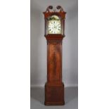 AN EARLY 19TH CENTURY MAHOGANY LONGCASE CLOCK, by WM Chapman of Lincoln, having a 30cm arched dial