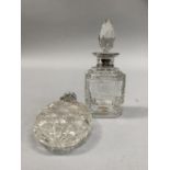 A VICTORIAN OVAL FLASK SHAPED CUT GLASS SCENT BOTTLE WITH SILVER TOP, London 1883, 11cm, and a