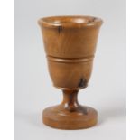 A TURNED FRUITWOOD GOBLET, 17.5cm high