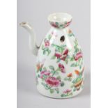 A 19TH CENTURY CHINESE FAMILLE ROSE EWER painted with insects amongst peony, 12cm high