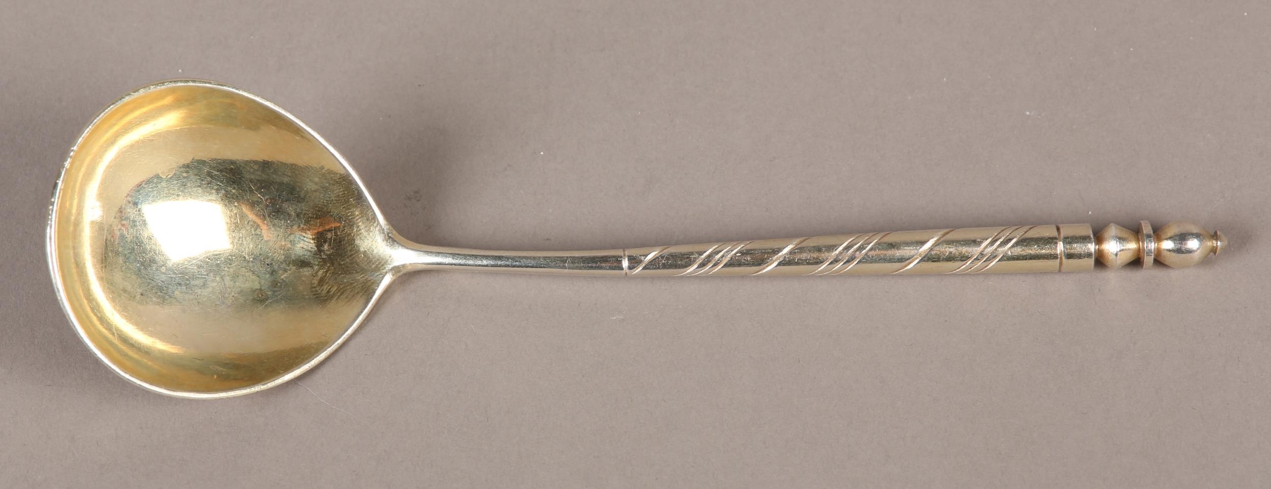 A RUSSIAN SILVER GILT SPOON .84 STANDARD, Moscow 1844, the oval bowl engraved and niello with