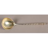 A RUSSIAN SILVER GILT SPOON .84 STANDARD, Moscow 1844, the oval bowl engraved and niello with