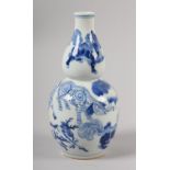 A CHINESE BLUE AND WHITE DOUBLE GOURD VASE, 19th century, painted with mythological beasts, tiger,
