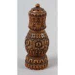 A LATE 18TH/EARLY 19TH CENTURY CARVED FRUITWOOD PEPPERMILL of baluster form, 11.5cm high