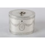 A GEORGE III SILVER TEA CADDY, John Denzilow, London 1779, oval, the disc lid with flower spray