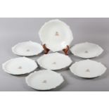 SIX CAULDON CO CHINA DESSERT PLATES with scalloped and moulded edges, painted to the centre with