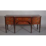 A GEORGE IV MAHOGANY AND EBONY BANDED BREAKFAST SIDEBOARD, having a reeded rim above a drawer and