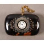 A 19TH CENTURY TORTOISESHELL PURSE, the cushion case set to the front with a small white enamel dial
