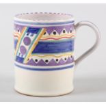 A CARTER STABLER ADAMS POOLE POTTERY MUG c.1930, designed by Truda Adams, red earthenware body and