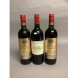 Two bottles Chateau Grand Barrail-Lamarzelle Figieac 1998 St Emilion Grand Cru, top shoulder levels;