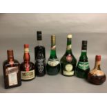 Seven bottles of classic liqueurs 60s-90s packaging; one litre Benedictine DOM 40%, 50cl '