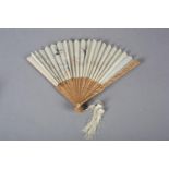 A 20th century Chinese carved sandalwood fan, the white cotton gauze embroidered with two