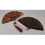 A later 19th century tortoiseshell brisé fan, the fifteen sticks and two guards wedge-shaped and