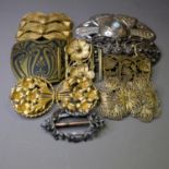 Art Nouveau and later metal buckles, a good selection manly in gold metal, one being in filagree