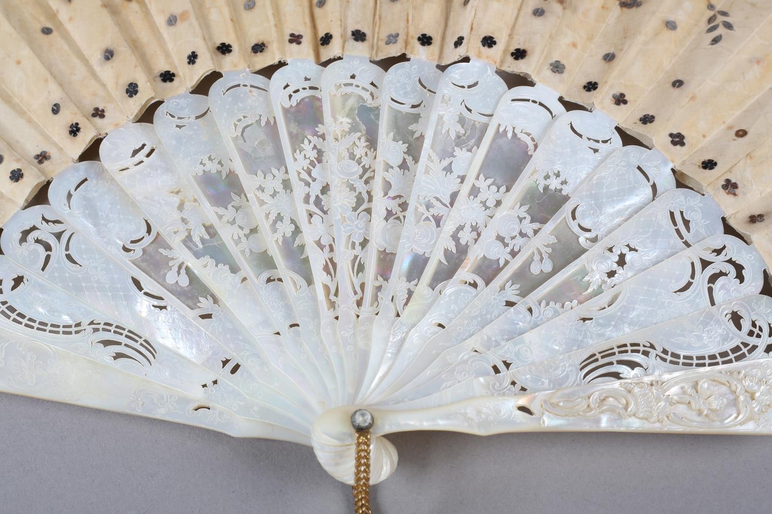 A c.1880’s mother of pearl fan with very elaborate carving, the guards pierced then applied with - Image 2 of 6