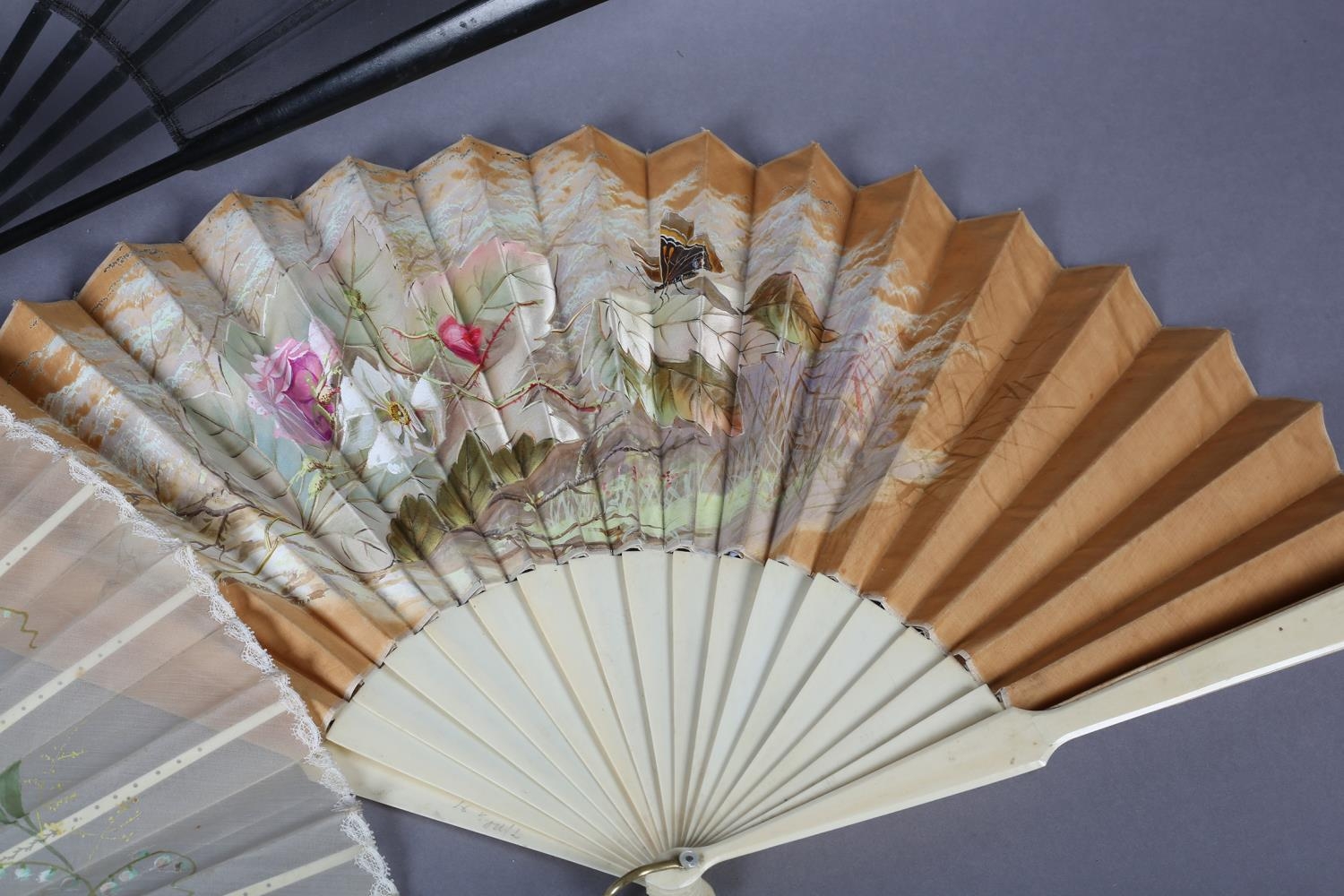 Three large fans from the 1890’s, the first painted on biscuit-coloured cotton with delicate roses - Image 4 of 4