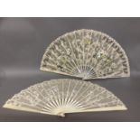 Two summer fans from the 1890’s, the first with pink mother of pearl monture, the leaf of cream