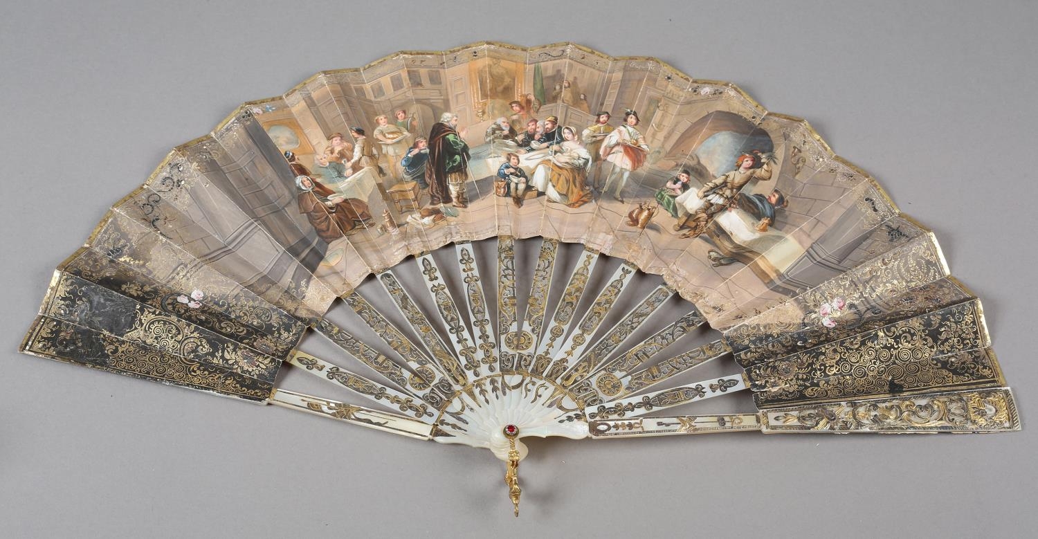 A medieval banquet: a good mother of pearl fan, the monture silvered and gilded, showing the