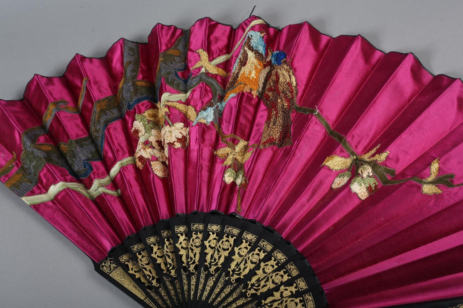 Three late 19th century fans, all with wood montures, with decorative gilding, the cerise silk leaf, - Image 4 of 6