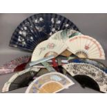 A large selection of Chinese tourist fans, from the 20th century, one very large with birds and