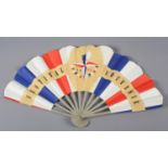 A paper fan commemorating the Festival of Britain in 1951, mounted à l’anglaise, a souvenir in red