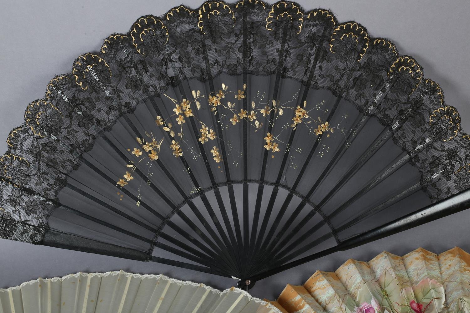 Three large fans from the 1890’s, the first painted on biscuit-coloured cotton with delicate roses - Image 3 of 4