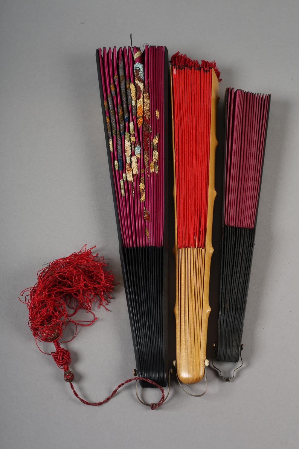 Three late 19th century fans, all with wood montures, with decorative gilding, the cerise silk leaf, - Image 6 of 6