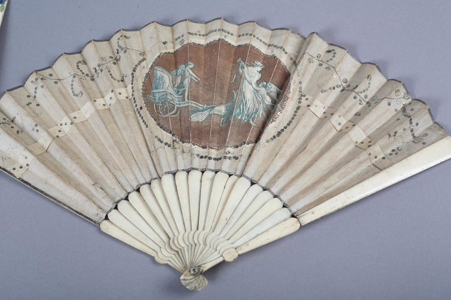An 18th century bone fan, the upper guards painted in chinoiserie fashion, the sticks carved as to - Image 4 of 8