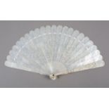 A fine Chinese mother of pearl brisé fan, Qing dynasty, the stick tips rounded, the two guards and