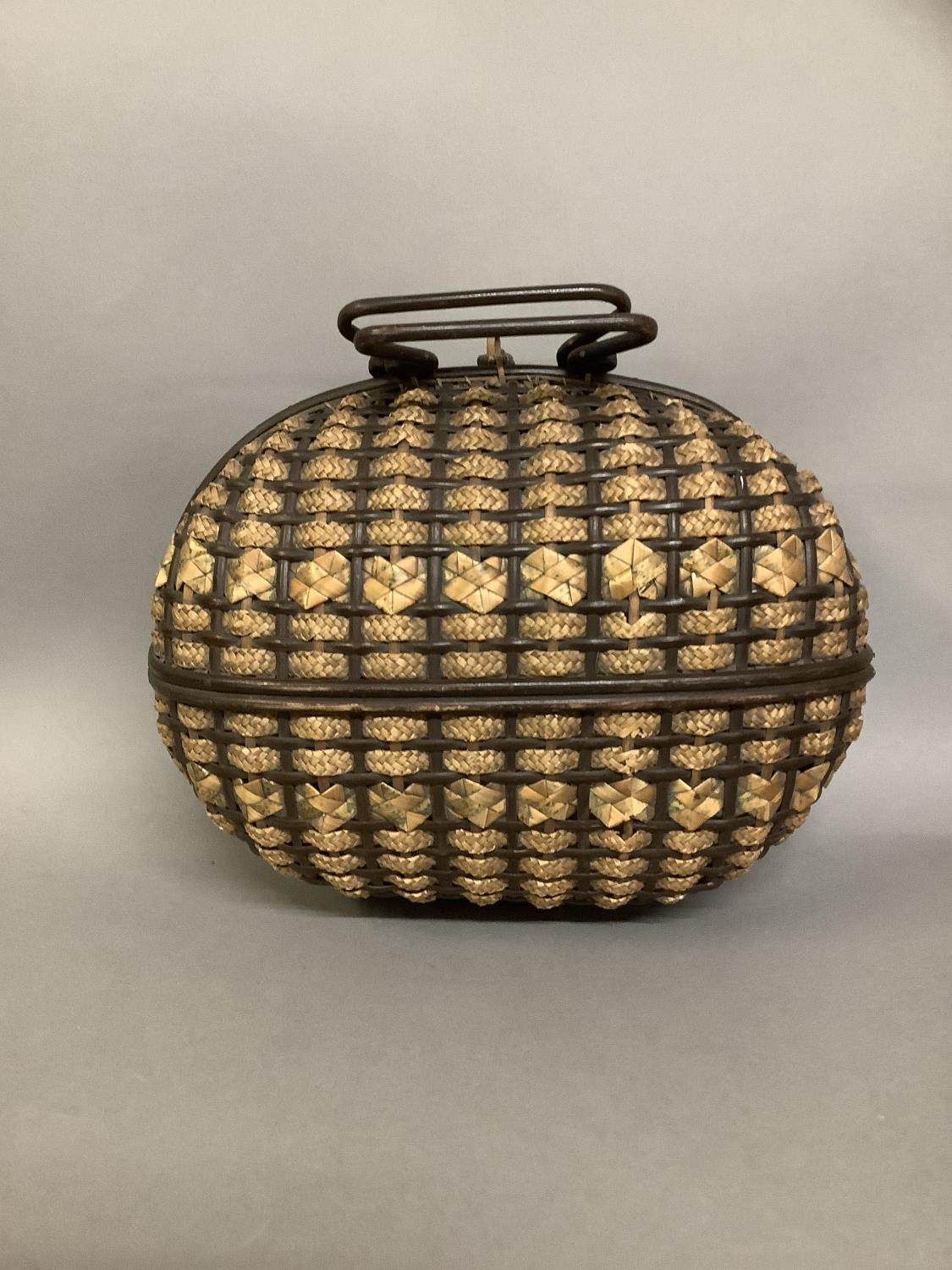 A Victorian lady’s honeycomb basket, in oval form, a work basket for sewing requisites, wood