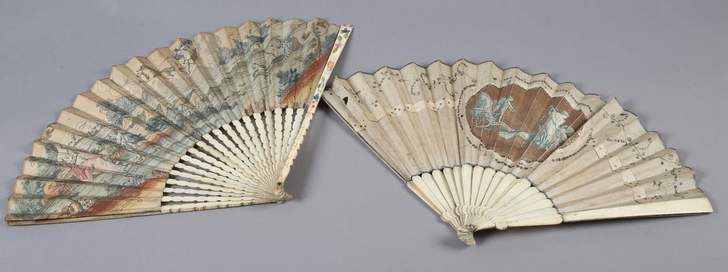 An 18th century bone fan, the upper guards painted in chinoiserie fashion, the sticks carved as to