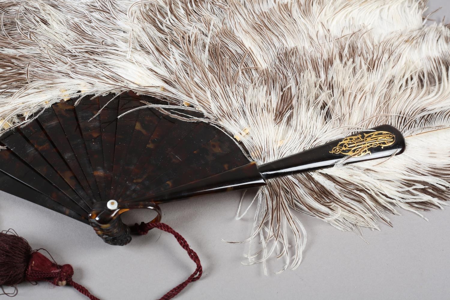 A Duvelleroy female ostrich feather fan, mounted on tortoiseshell, marked “Duvelleroy” in gold on - Image 2 of 4