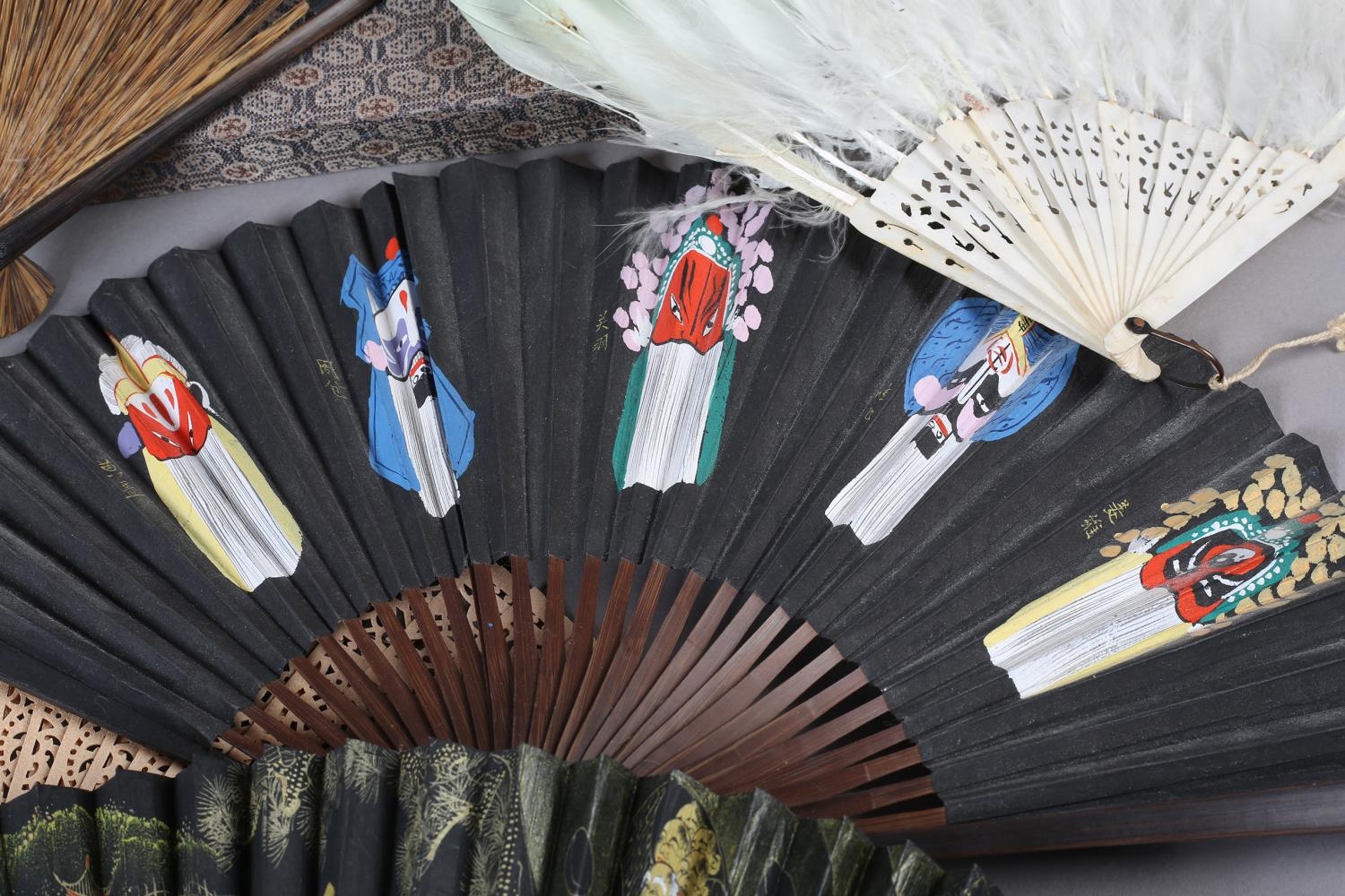 The Peking Opera: Eight 20th century Chinese fans, five of which are contained in brocade covered - Image 3 of 6