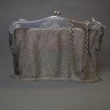 A continental silver mesh evening bag, with good solid frame, shaped and engraved, c 1900,