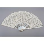 A Mixed Brussels lace fan, late 19th/ early 20th century, the monture of white mother of pearl,