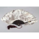 A Duvelleroy female ostrich feather fan, mounted on tortoiseshell, marked “Duvelleroy” in gold on