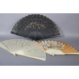 Three large fans from the 1890’s, the first painted on biscuit-coloured cotton with delicate roses