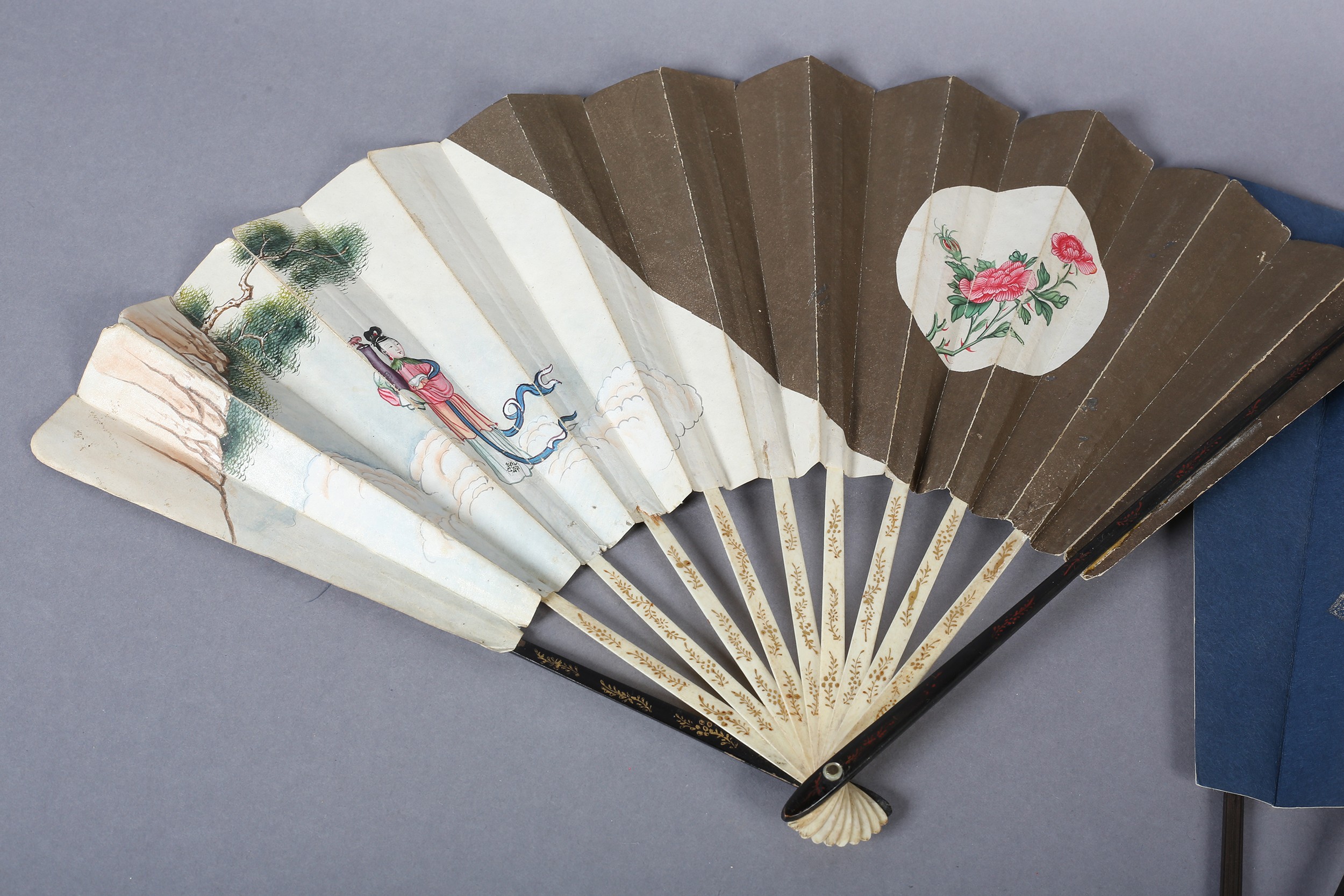 Two large Japanese fans, the first with a central portrait of a geisha, with hair accessories and - Image 3 of 4