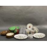 Two turned wooden bowls, a green glass and white metal fruit basket, Wedgwood Wild Strawberry