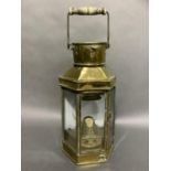 An Eli Griffiths and Son brass cased bull pit lamp, 1915