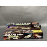 A Le Mans 24 hour Scalextric in original box, together with two Scalextric cars in original boxes