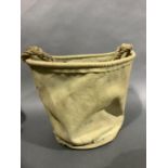 A WWII canvas wash kit bucket by Maple & Co 1941