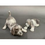 Two Lladro puppies, 11cm high and 7cm