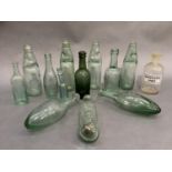 Four vintage glass Codd bottles marked for Bilton, Harrogate, Barraclough Harrogate, Harrogate