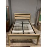 A HipHop double bed by Sleepmasters with pale elm slatted frame of contemporary design