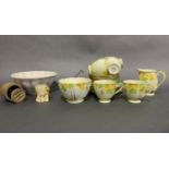 A Grafton china tea service painted with yellow and green leaves with berries, a Cetem jelly